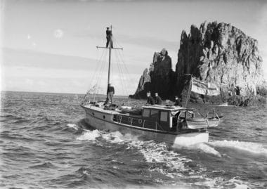 Patrol vessel Lady Gay's role in the early days of WW2 was to patrol the inner areas of the Hauraki Gulf and the Waitemata Harbour. In this photograph she is seen near Poor Knights Island during an outer patrol of the Hauraki Gulf ca. 1942.