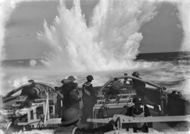Depth charge explosion off the stern of HMNZS Arabis, Hauraki Gulf December 1944. Image was published in the Auckland Weekly News 06/12/1944.