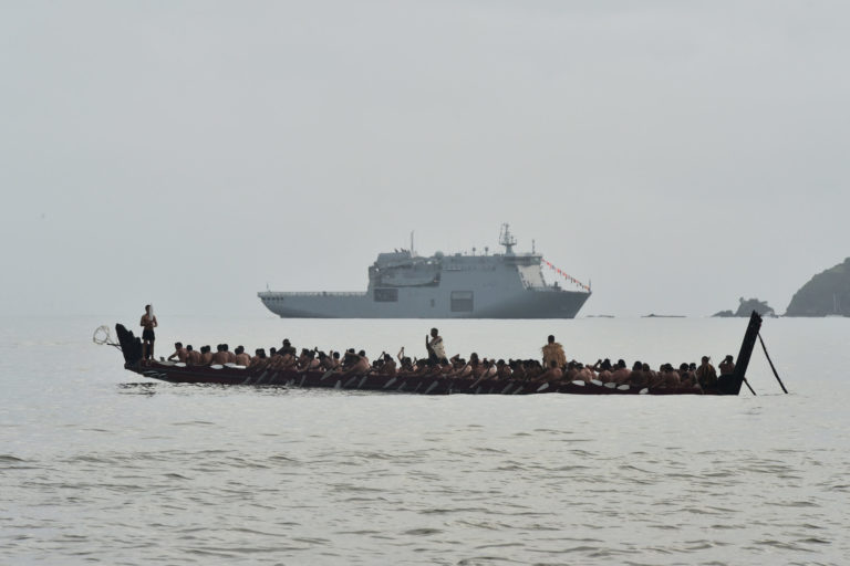 – 2016 Waitangi Day Celebrations. HMNZS Canterbury and a waka