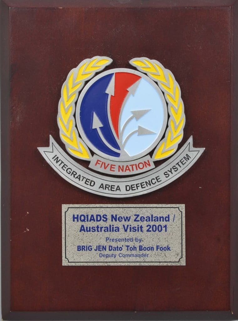 Plaque, HQIADS Presented to New Zealand representatives visiting HQIADS in 2001