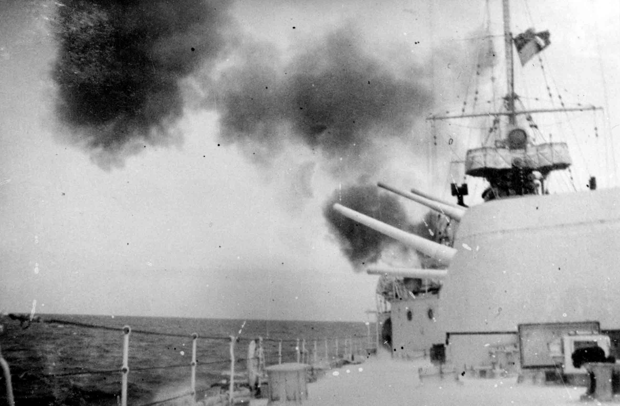 HMNZS Achilles X and Y turrets firing at the Battle of the River Plate
