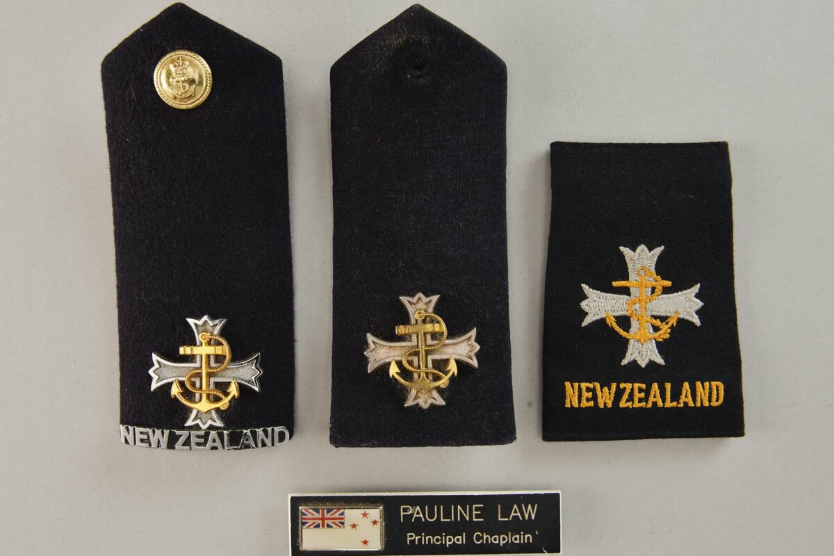 Epaulettes (2017.270.1-2), shoulder slides (2017.270.3) and name tag (2017.270.5) belonging to Pauline.