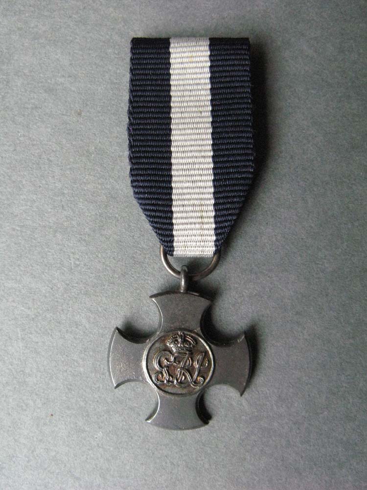 Distinguished Service Cross miniature medal awarded to Lt Malcolm Kirkwood for saving his ship during the raid on Ostend 22-23 April 1918