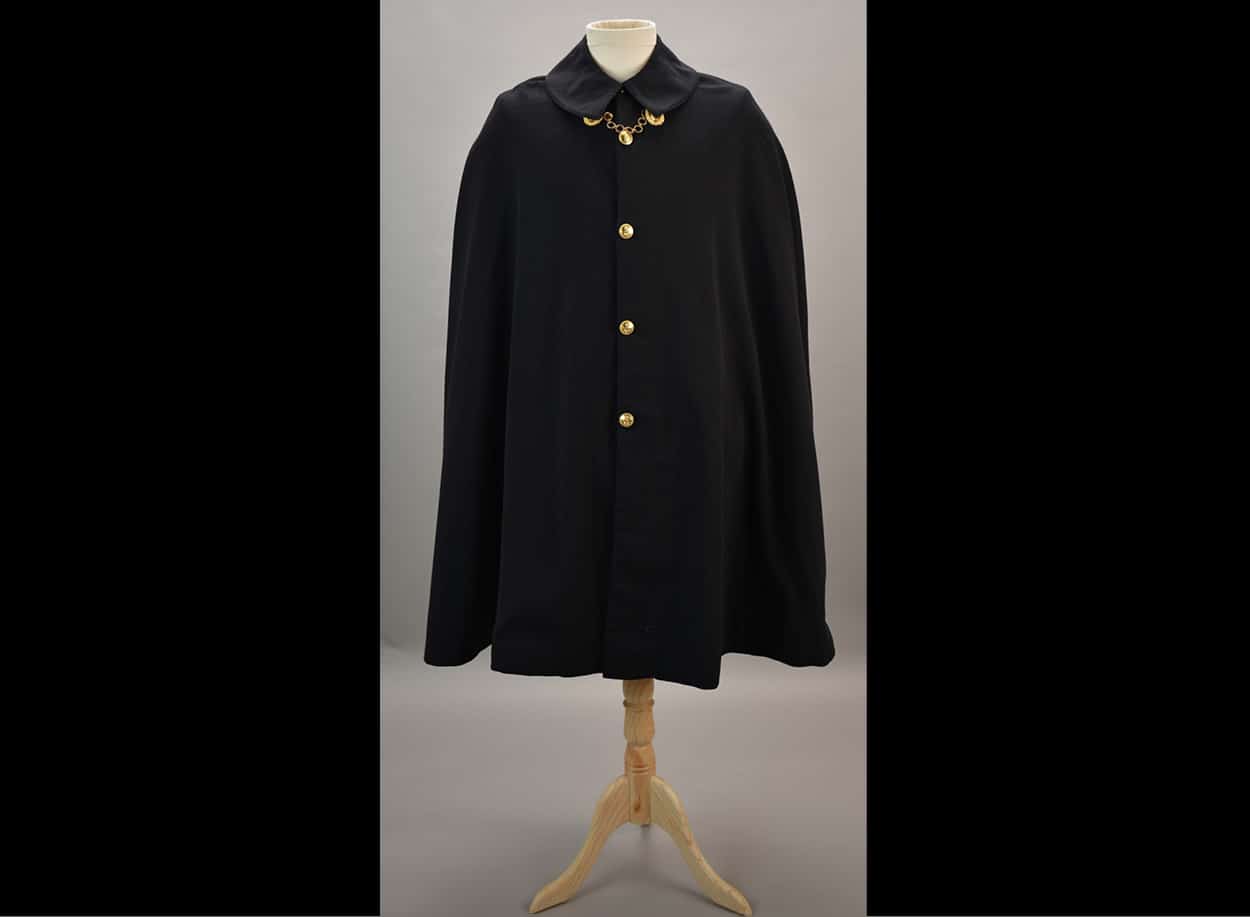 Naval Boat Cloak worn on ceremonial occasions by CDR Elworthy.