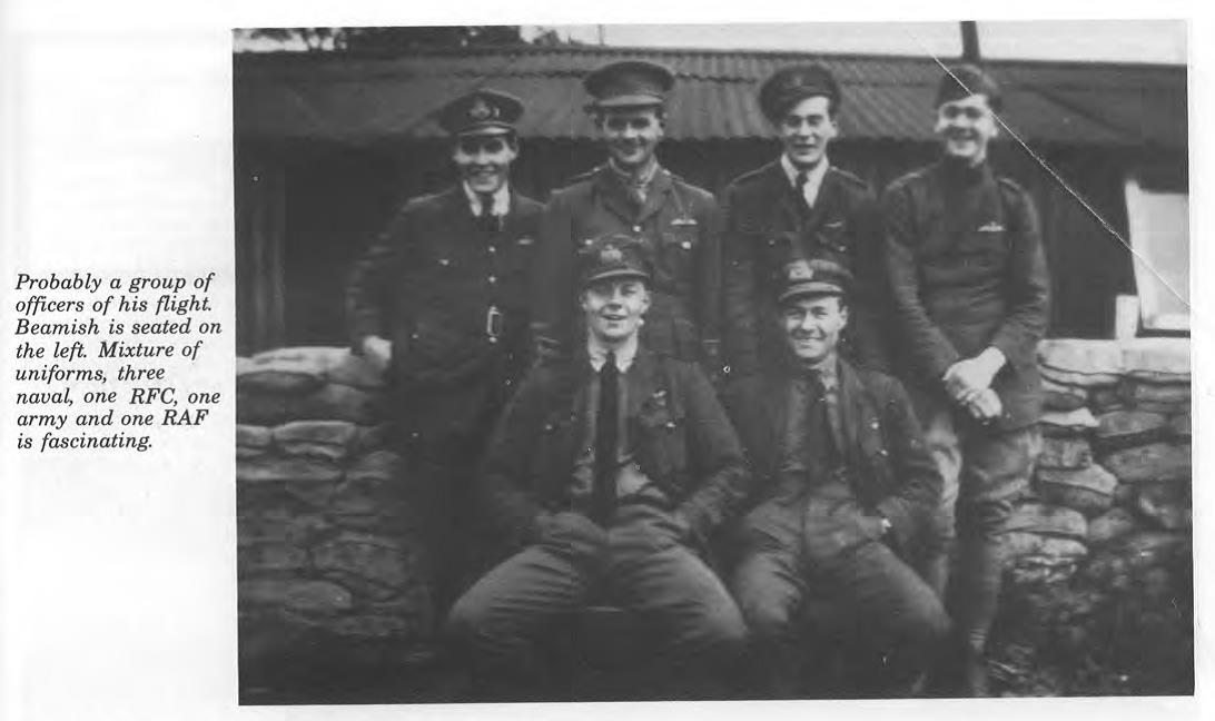 Probably a group of officers of his flight. Beamish is seated on the left. Mixture of uniforms, three naval, one RFC, one army and one RAF is fascinating